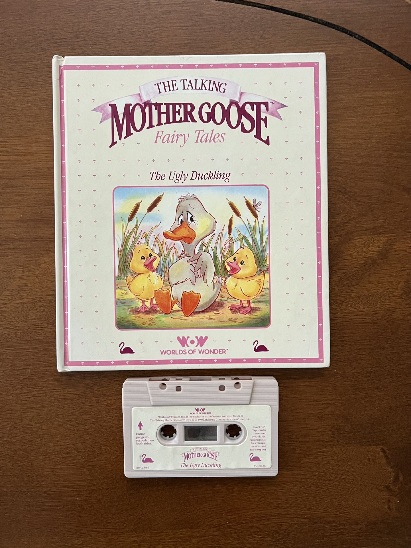 Worlds of Wonder, Talking Mother Goose The Ugly Duckling Book & Cassette Tape  You will receive the book and cassette tape. Tape has not been tested. 