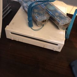 Nintendo Wii And 2 Controllers 