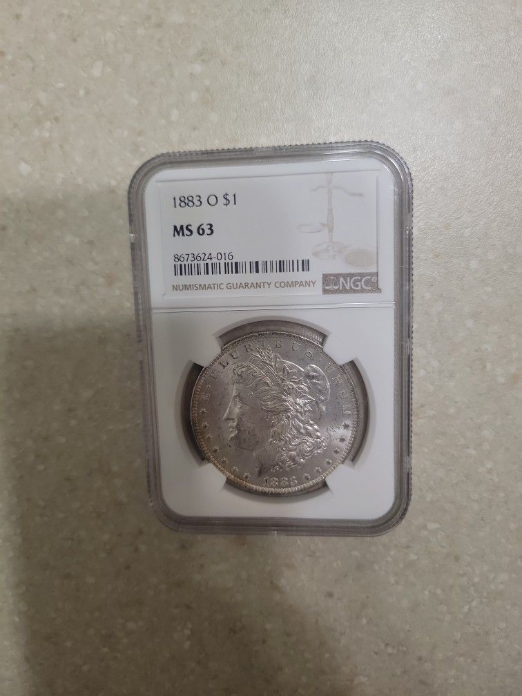 1883 O Morgan Silver Dollar.  Graded 