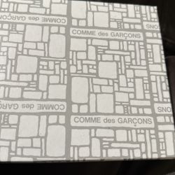 Comme Des Garçons Embossed Zip Wallet 