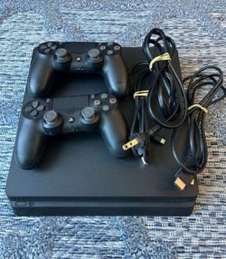 PS4 with all cords and 2 controllers