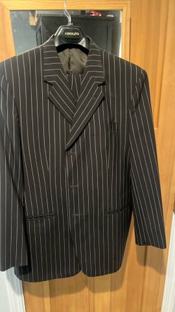 Men’s brown suit with gold pinstripes.