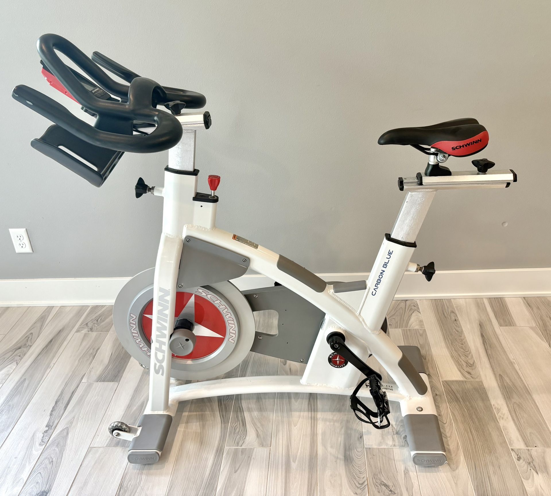 Schwinn AC Performance Carbon Blue Indoor Cycling Bike – Magnetic Belt Drive