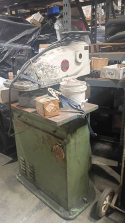 Old swing arm press machine