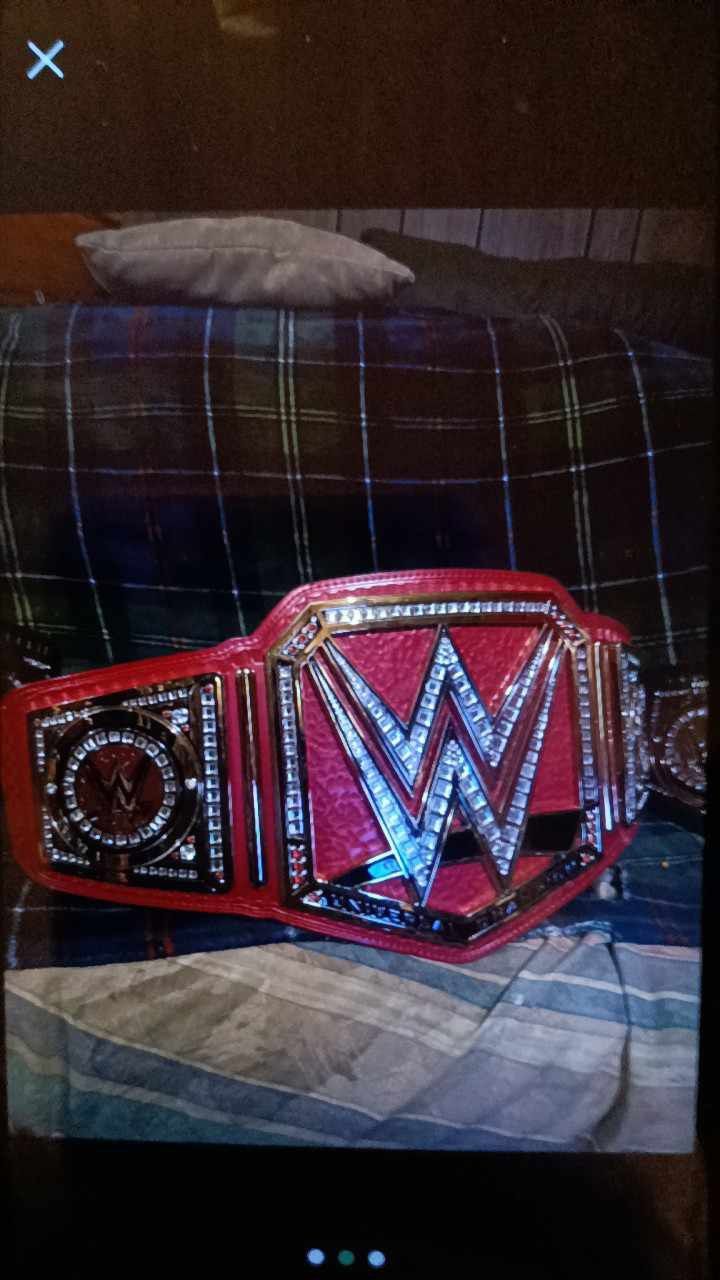 WWE Championship And WWE Red Universal Championship Commemorative Belts