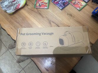 Pet grooming vacuum