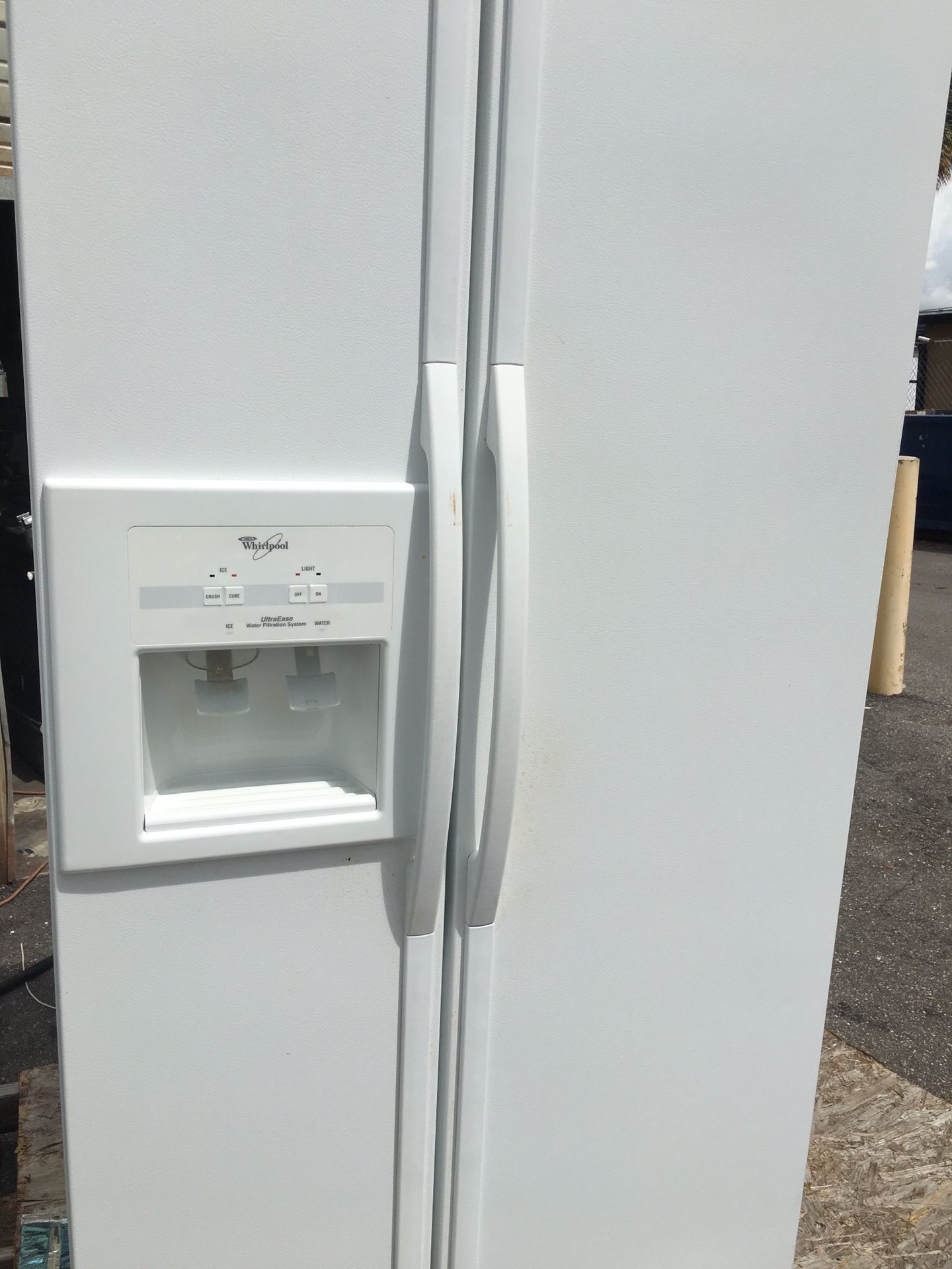 Whirlpool white side by side refrigerator