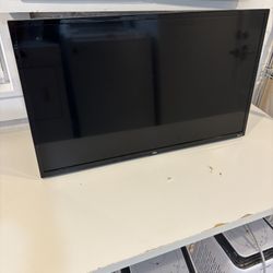 32 Inch TCL Roku TV w/wall mount