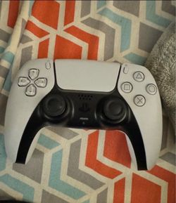 Ps5 console with 2 DualShock controllers b/w