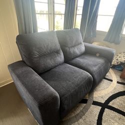 Power Reclining loveseat (transferable warranty)
