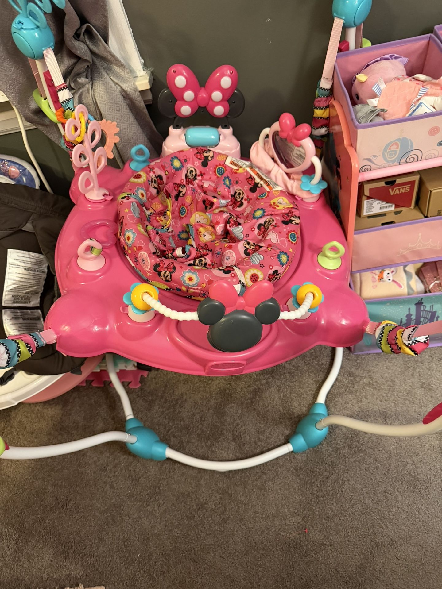  Bright Starts Disney Baby MINNIE MOUSE PeekABoo Baby Activity Center Jumper with 8 Toys, Lights & Sounds, 360-Degree Seat, 6-12 Months (Pink/Blue)