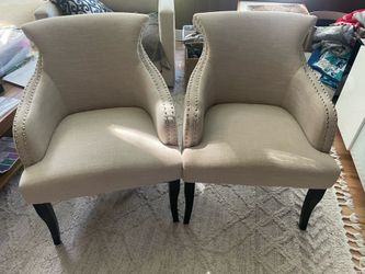 2 Chairs (fabric) beige/creme with black footings.