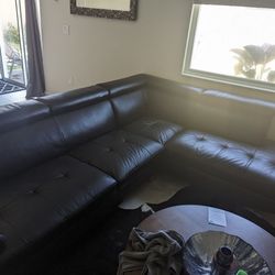 Black Couch With Adjustable Head Rests.