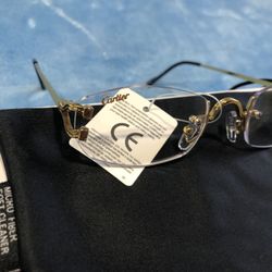 Clear, small C  Cartier’s.  #77