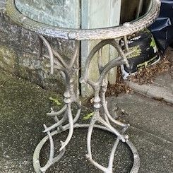 Elegant Metal Table with a Glass Top