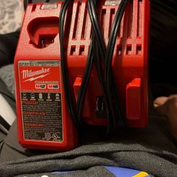 Red Milwaukee Battery Charger 
