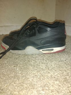 black and red Air Jordan 4 RM sneakers size 9