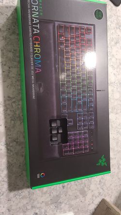 Razor Ornata Chroma And A Razer Abyssus Essential Mouse And A Mouse Pad