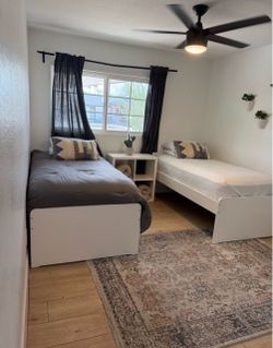 Two twin beds and mattresses!