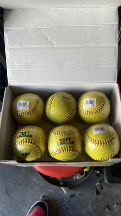 Soft compression softballs