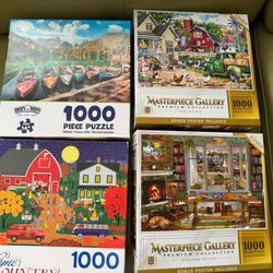 Four 1000 Piece Puzzles 