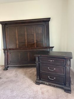 Wood king size bed and two night stands