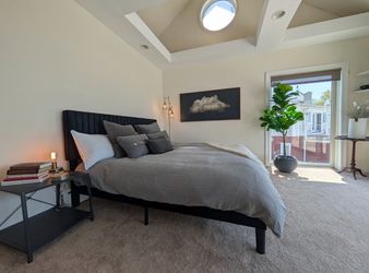 Black upholstered king bed frame
