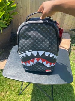 Spray ground backpack