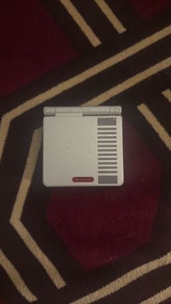 Gameboy Color SP (NES edition) with Pokemon Ruby