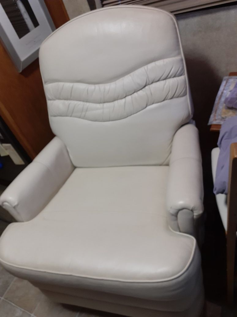 Jackknife style rv couch. $250, cream colored, removable arm rests. Good condition. Recliner matches couch.