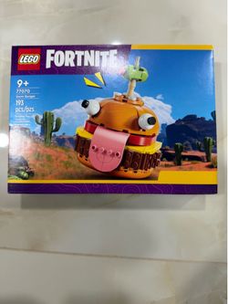 LEGO Fortnite Durrr Burger building set (77070), featuring iconic details like the eyes, tongue, and olive on a toothpick