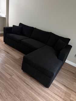 Brand new black sectionals in stock