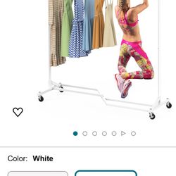 Rolling Clothes Rack In Excellent Condition 