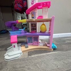 Fisher-Price Little People Barbie® DreamHouse Playset with 4 Vehicles & 6 Figures