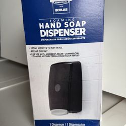Hand in soap dispenser accepting offers