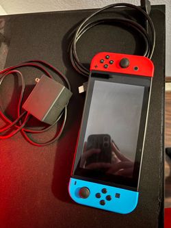 Nintendo switch red blue case controller charger hdmi