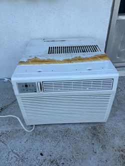 Wall or window air conditioner in good condition, Midea brand.
