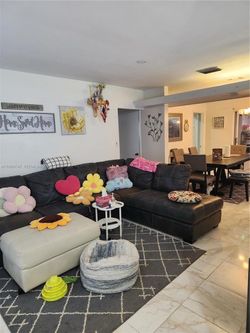 Used Dark Brown L-Shaped Sofa from Rooms To Go
