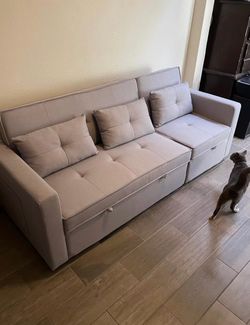 Light Gray Tufted Sofa with Storage