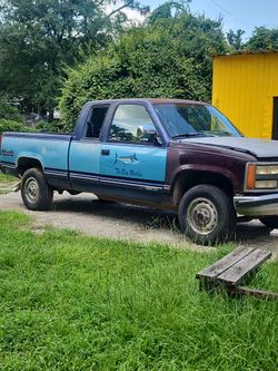 93 GMC TITULO AZUL EN MANO