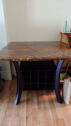 Gently used granite dining or kitchen table...very heavy..