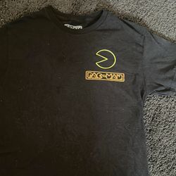 black Pac-Man graphic T-shirt featuring the Pac-Man logo and character