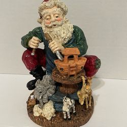 Santa figurine carving Noah’s Arc. 7.5” high made of resin. 