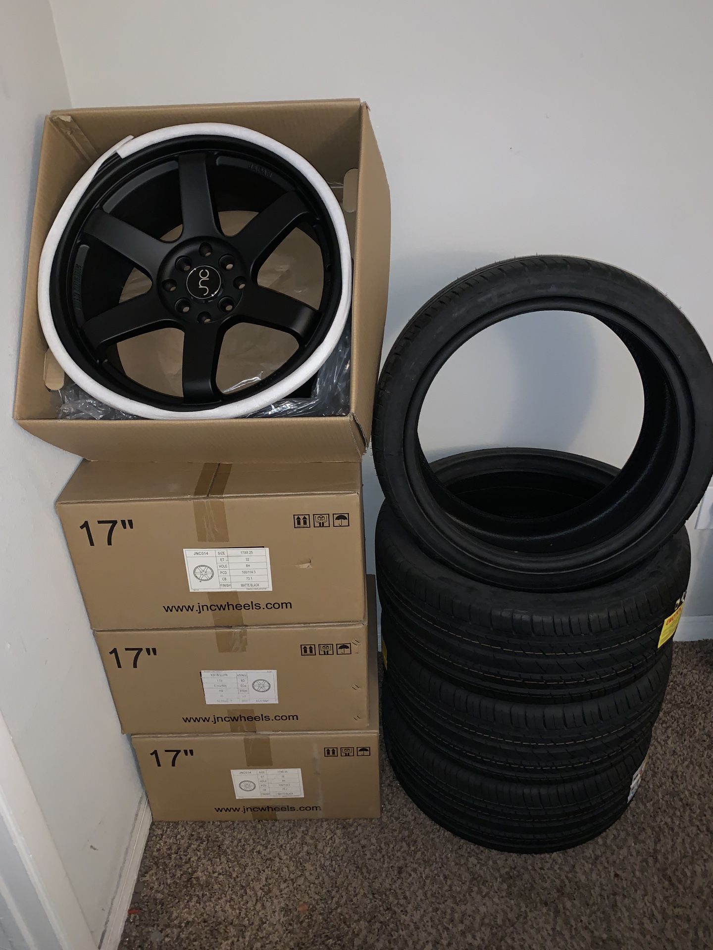 JNC 17 X8.25 Black Rims and tires BRAND NEW IN BOX NEVER INSTALLED.