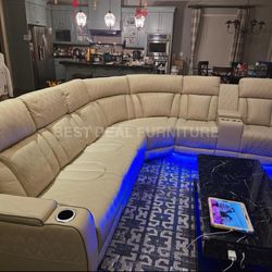 Beige power reclining sectional couch