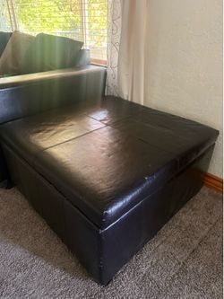 Huge Dark Brown Faux Leather lift-top storage ottoman features safety hinges for secure closing.