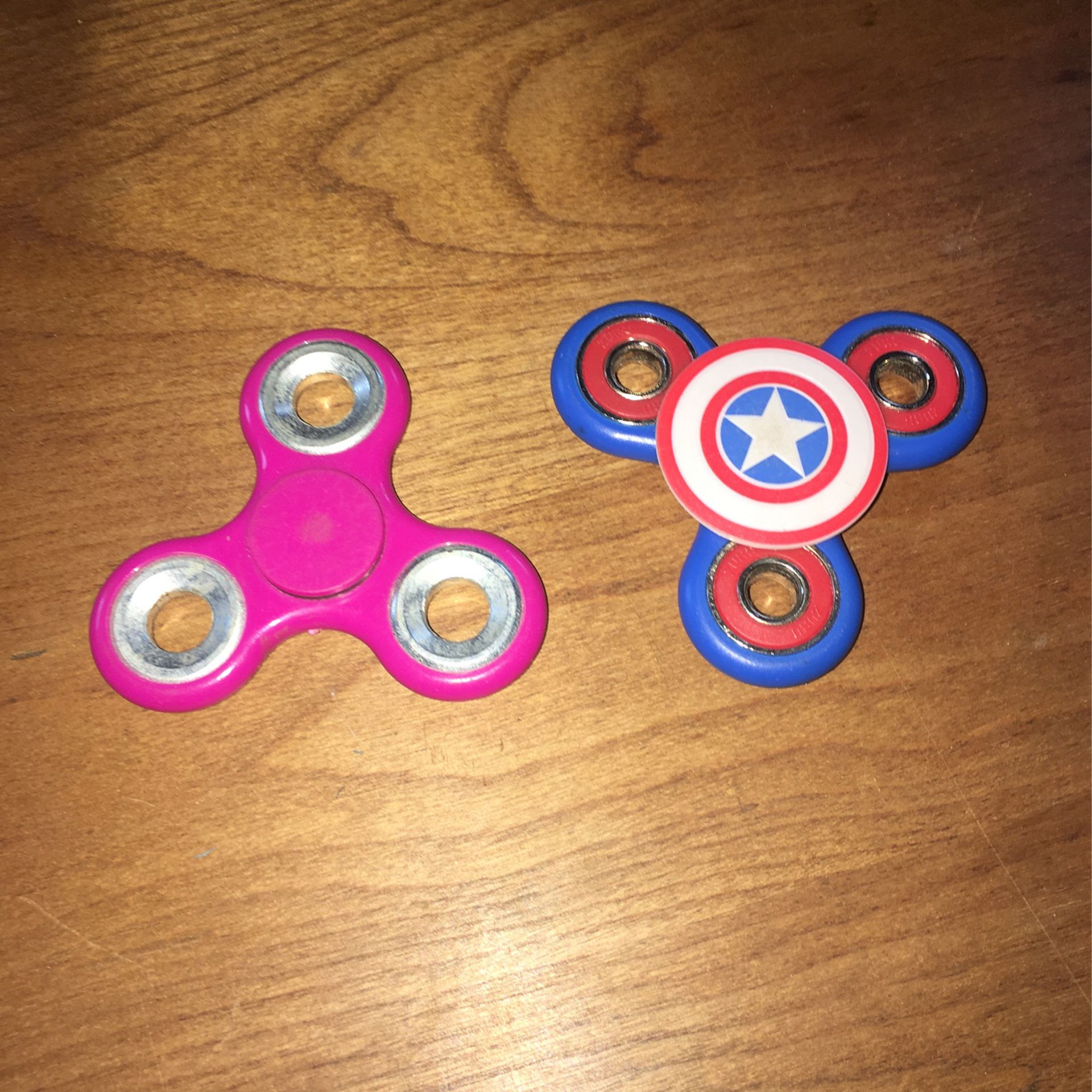 lCustom “Marvel” Captain America fidget spinner and 1 pink fidget spinner