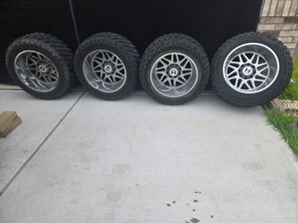 22x14 8x180 hostile wheels