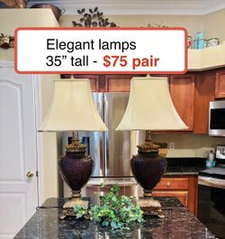Elegant pair of lamps with silk shades. 35” tall , excellent condition