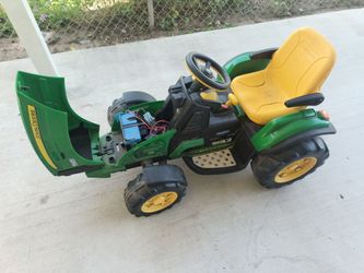 kids riding tractor